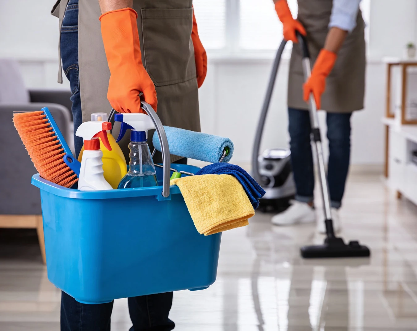 Commercial and residential cleaning supplies with staff working in background