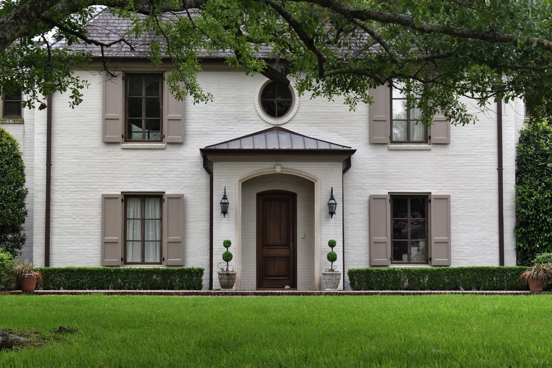 Well-kept traditional residential property with landscaped front entry